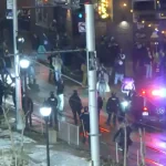12 Anti-ICE agitators arrested as crowd swarms Minneapolis Hilton hotel