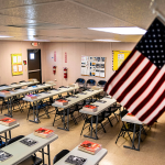 Nude pictures popped up on screen at school as district launches probe