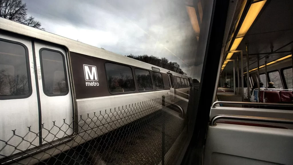 Work vehicle hits stopped train in DC, injuring 11 and disrupting Silver Line
