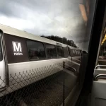 Work vehicle hits stopped train in DC, injuring 11 and disrupting Silver Line