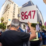 May Day protest: ’86 47′ signs surface following Comey’s indictment