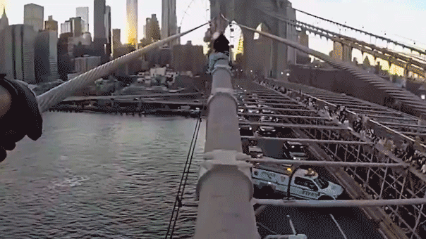 NYPD bodycam captures Brooklyn Bridge rescue of woman in crisis
